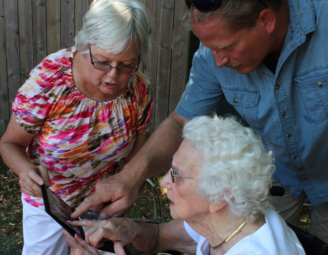Sharing family memories, Grimm family at Greenfield Village Sharing family memories, Grimm family at Greenfield Village