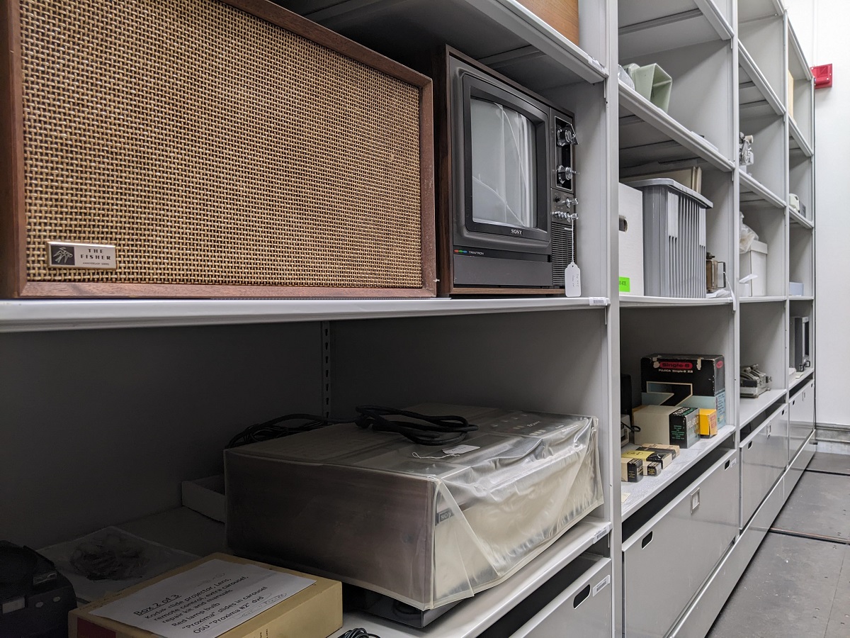 Editing equipment used by Lillian Schwartz Storage shelves filled with electronic equipment