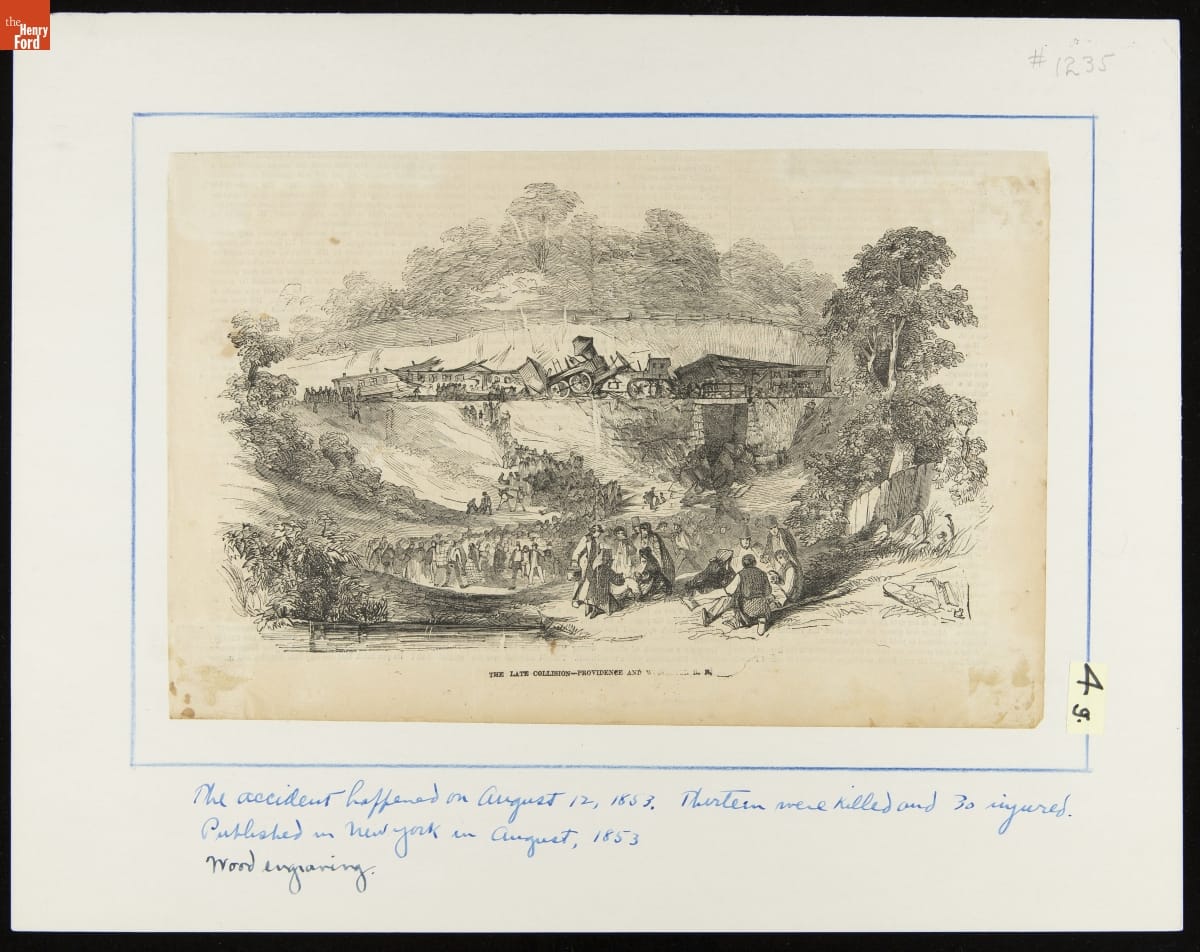 Print of a train crash with many people gathered around; with handwritten text at bottom