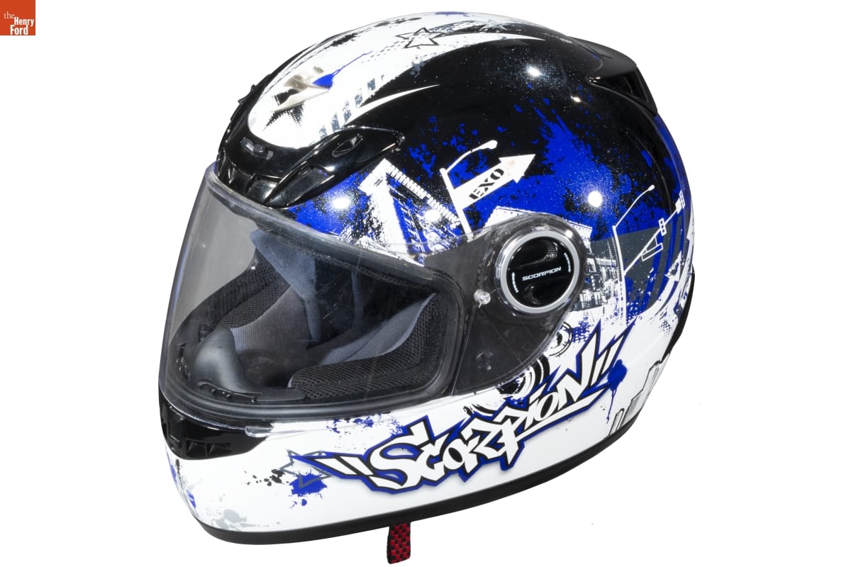 ScorpionEXO Racing Helmet Worn by Armani Williams while Competing in the ARCA Truck Pro Series, circa 2016 White, blue, and black helmet with "graffiti" style text and pattern
