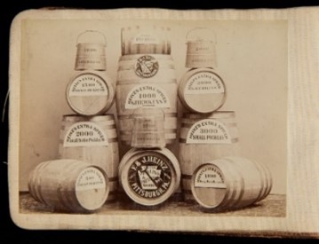 Arrangement of barrels with text on them