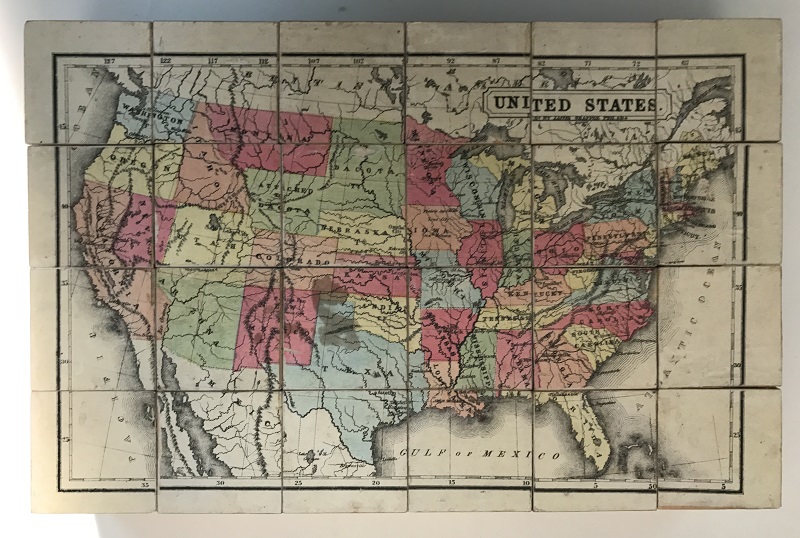 Picture blocks showing a map of the United States Blocks arranged to show a line drawing of the United States, with states shaded in various colors