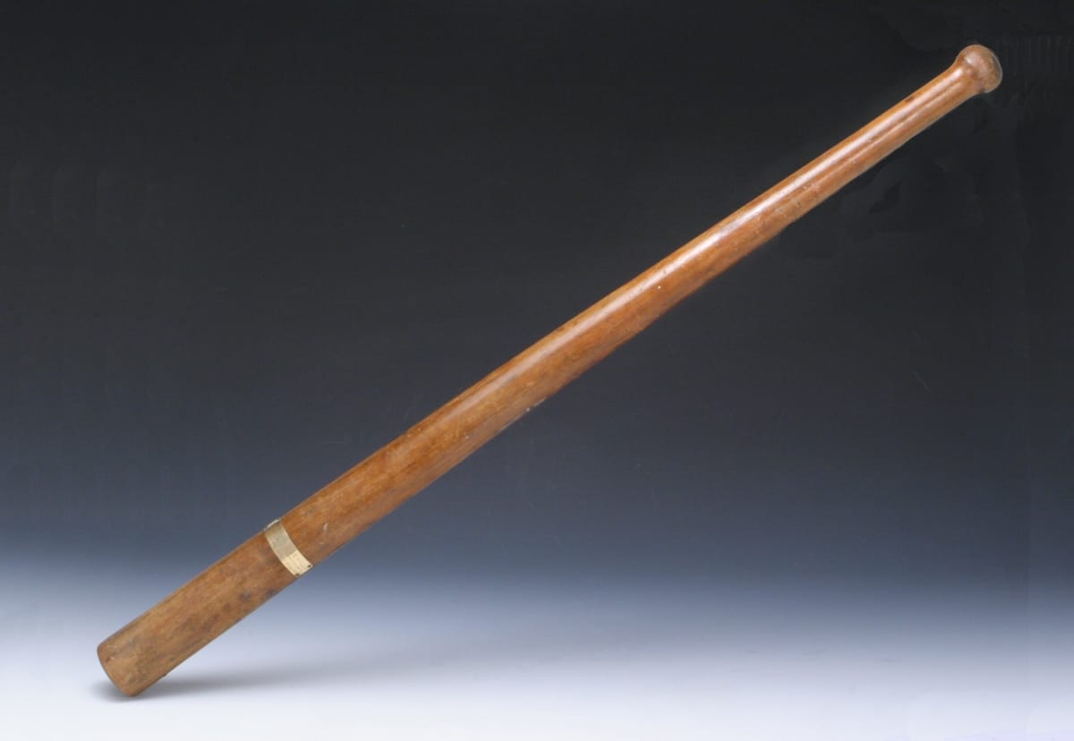 Baseball Bat Presented to John L. McCord for First Prize at the World's Tournament of Base Ball, 1867 Wooden baseball bat with narrow silver band around it