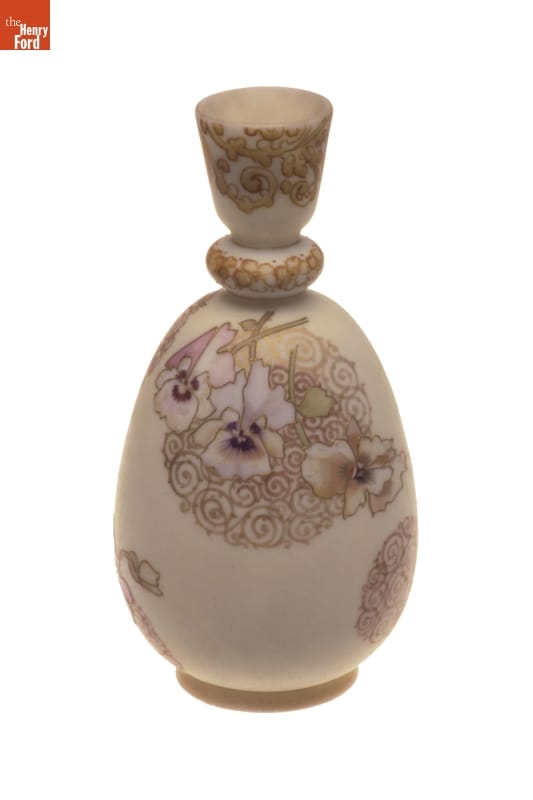 Crown Milano Vase, 1889-1891 Beige vase with intricate top and pattern of pansies and swirls