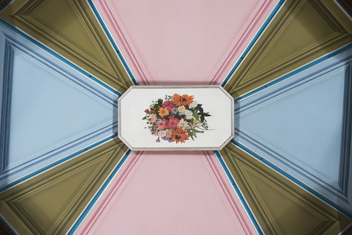 Kiosk From IBM Pavilion at the 1964 New York World's Fair, detail of underside Image of flowers in a white rectangle, surrounded by taupe, blue, and white geometric shapes highlighted with pinstriping