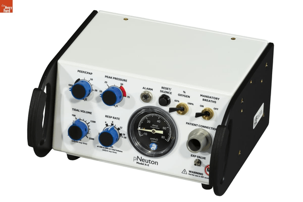 GIF that cycles through three images of white boxy equipment with knobs and dials on front--one plain, one covered in signatures, and one with one large signature on top
