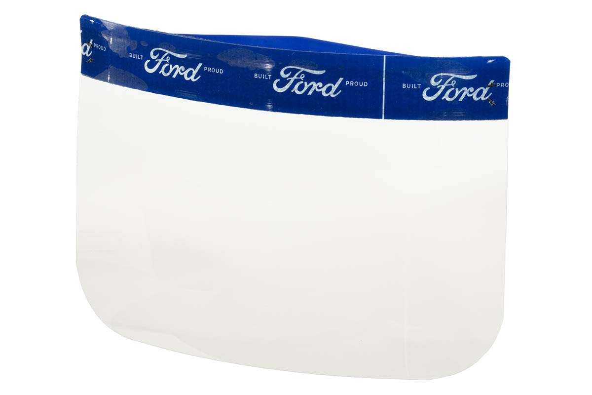Clear plastic rectangle with rounded corners, topped with blue band patterned with white text "Built Ford Proud"