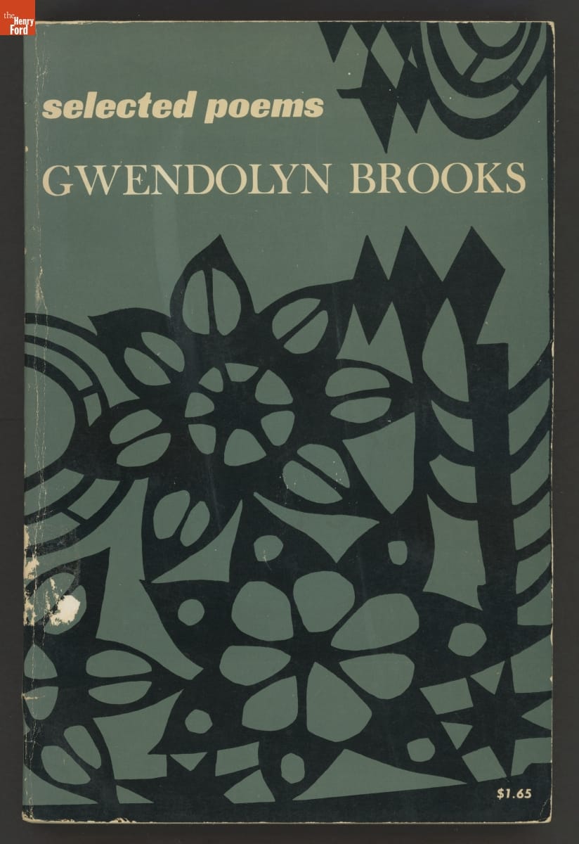 Green book cover with white text and black floral pattern