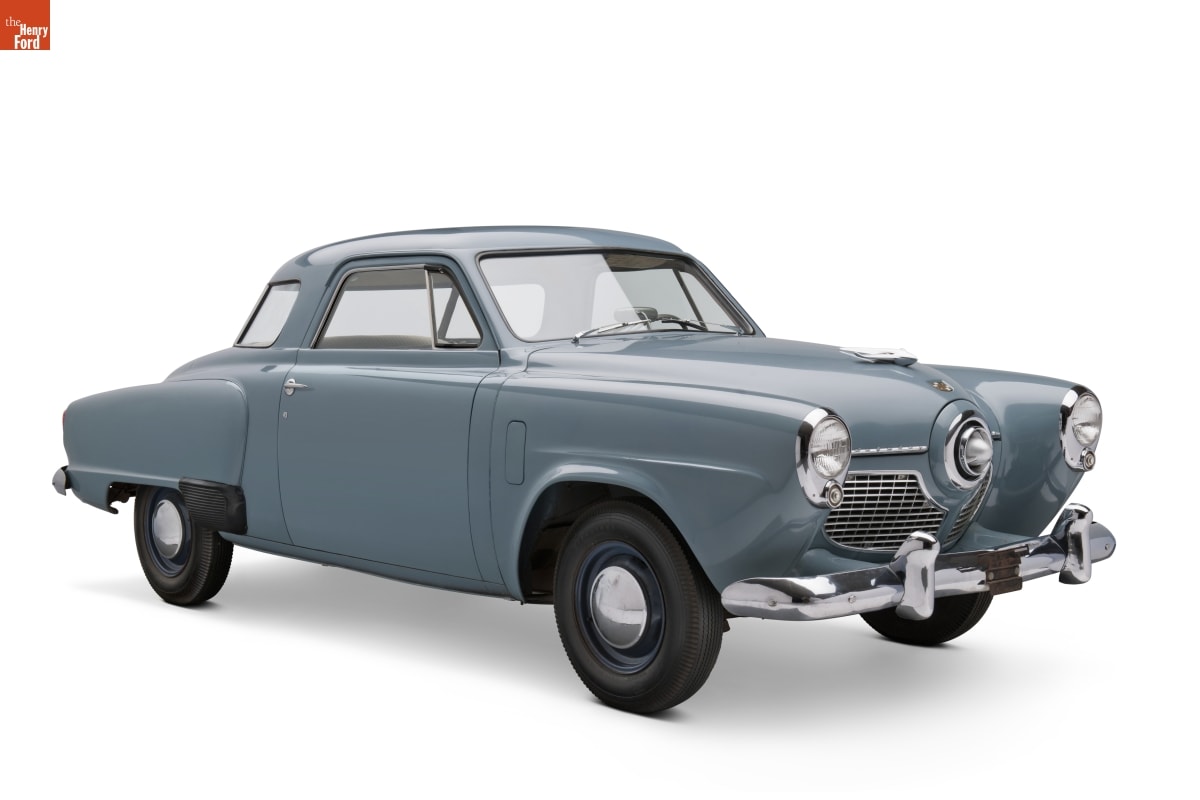 1951 Studebaker Champion Starlight Coupe Light blue car with distinctively pointed headlights and center front grille