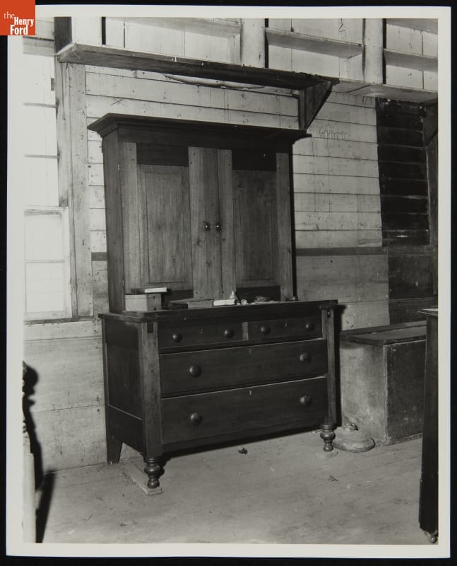Dr. Howard's Office at Its Original Site, Tekonsha, Michigan, March 1956, Interior View Black-and-white photo of dresser and hutch among other furniture