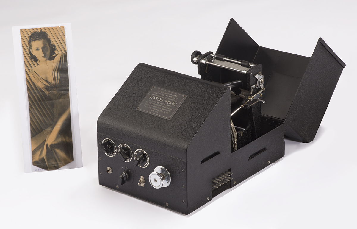 Piece of equipment next to image of woman