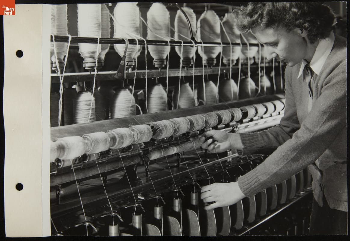 Woman with Machine Spinning Soybean Fiber into Soylon Thread, March 1943 Woman works at machine set up with many spools of yarn