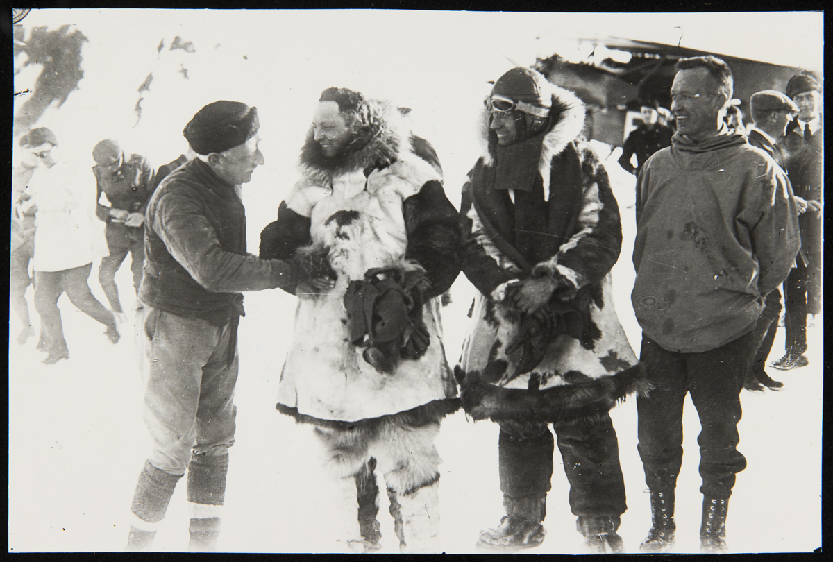 Roald Amundsen and Lincoln Ellsworth greet Richard Byrd and Floyd Bennett before the North Pole Flight Roald Amundsen and Lincoln Ellsworth greet Richard Byrd and Floyd Bennett before the North Pole Flight