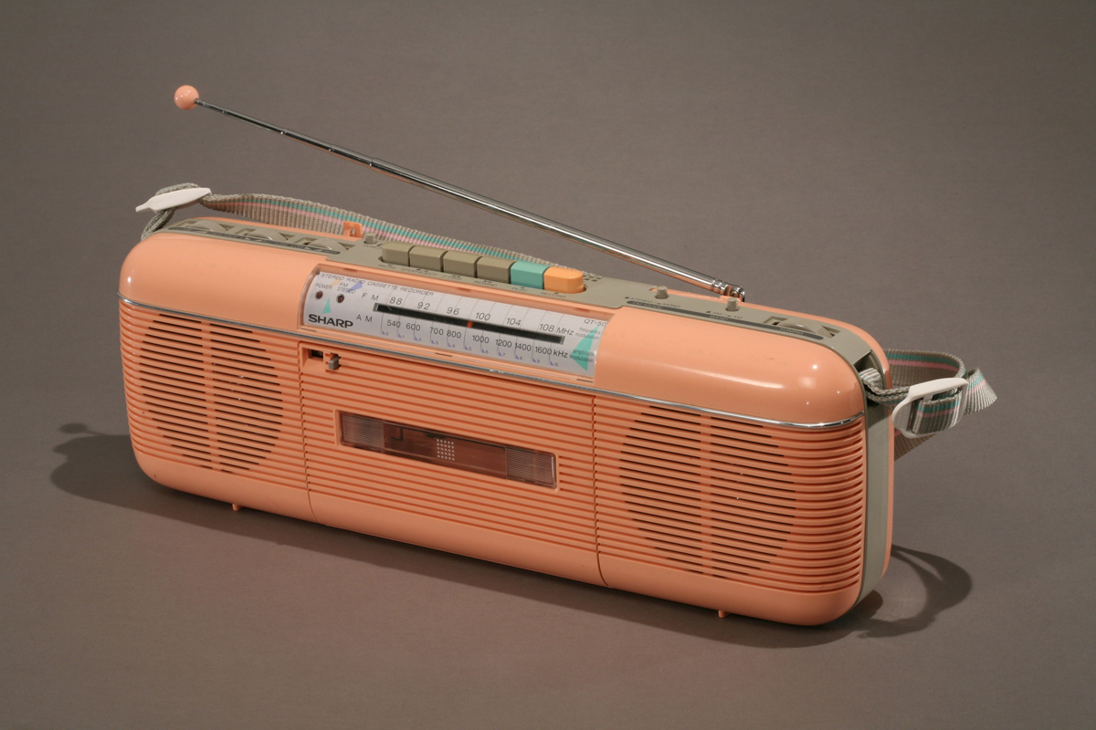 Sharp QT 50 Portable Radio Cassette Player, 1986 Long peach-colored cassette player and radio with antenna