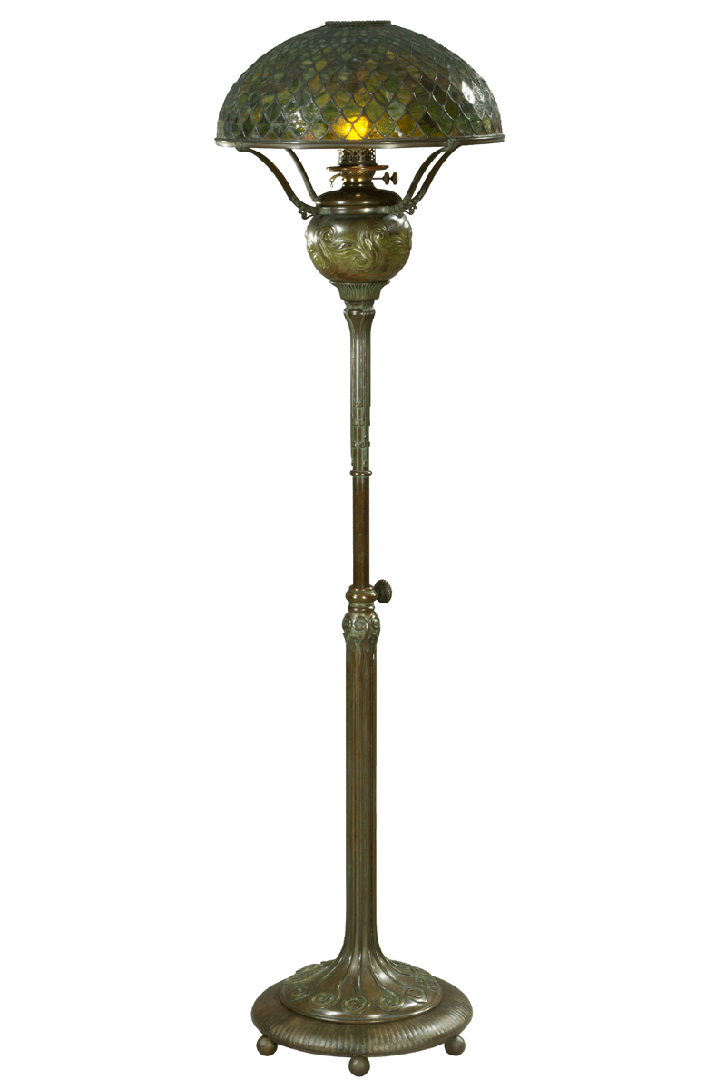 GIF rotating through several images and detail shots of a bronze floor lamp with domed glass shade in mottled greens and yellows