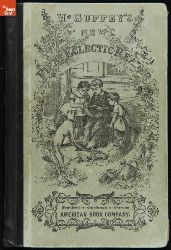 Book cover with text and image of children reading with a dog
