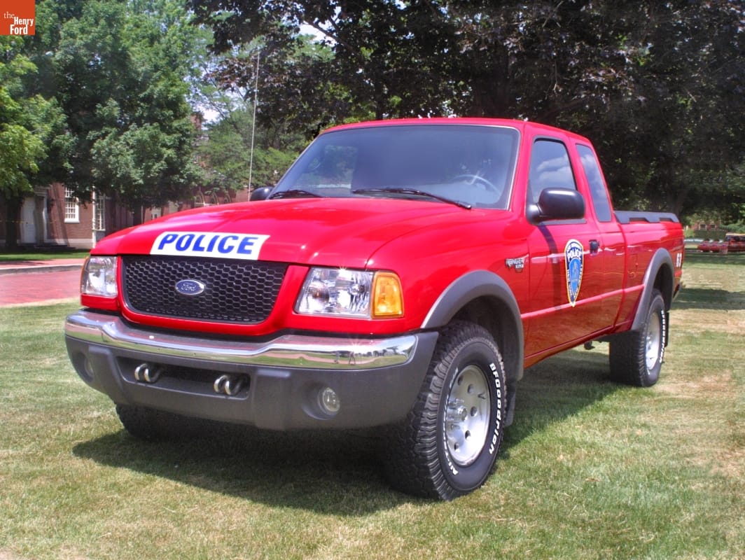 2002 Ford Ranger FX4 Truck, Used In the Rescue & Recovery Efforts after the World Trade Center Attacks of 11 September 2001 Red pick-up truck with badge on door and text "POLICE" on front of hood