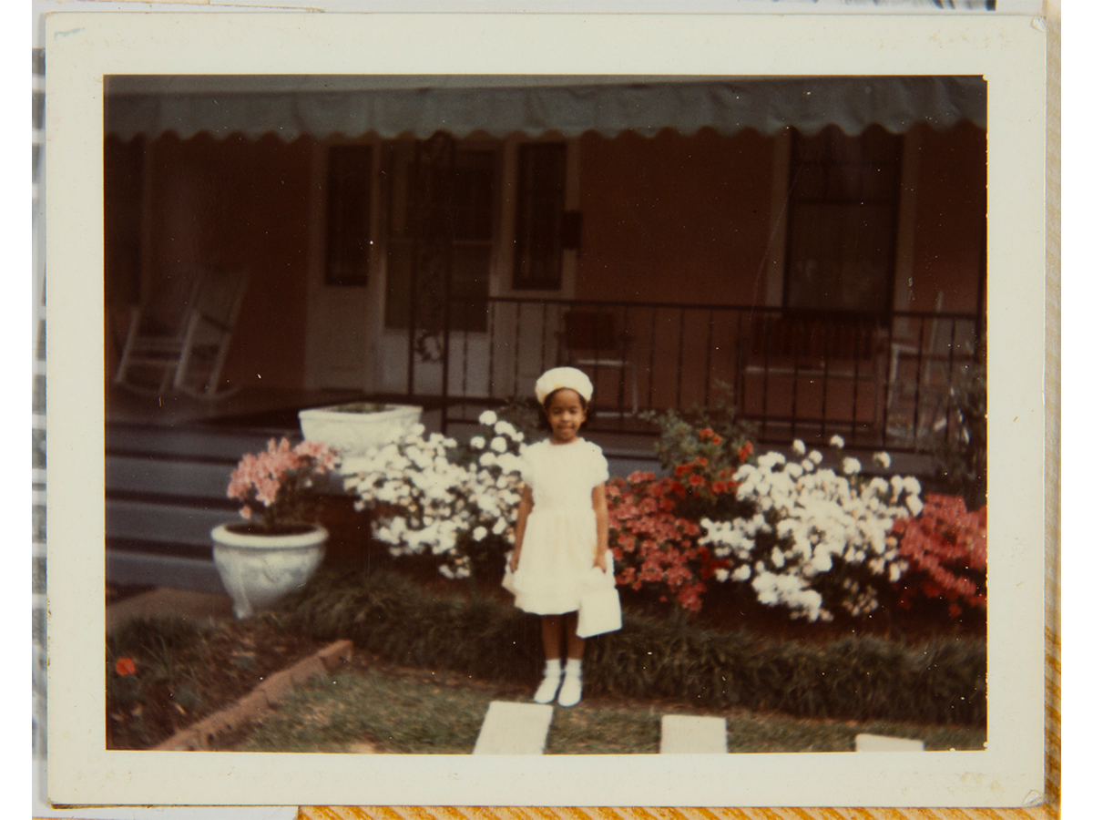 The front of The Jackson Home ca.1963. This image shows the 1950s configuration of the front porch that remained intact through 1965. / THF708601 