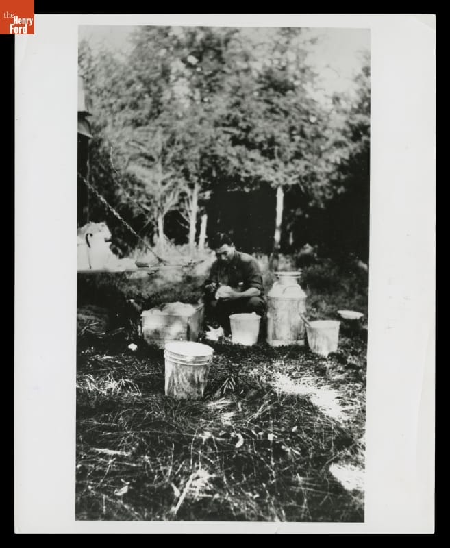 Tsuneji Sato preparing a meal at Sidnaw Lumber Camp in 1923